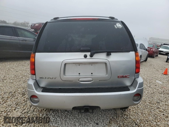 2009 GMC Envoy SLE with VIN 1GKDS33S492129469, listed as a Copart auction lot 83232024 with 131,735 mi miles and Salvage Title. Bid and sale history available at carsss.com. Image 6.