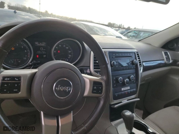2011 Jeep Grand Cherokee Laredo with VIN 1J4RR4GG1BC669834, listed as a Copart auction lot 52923845 with 173,943 mi miles and Clean Title. Bid and sale history available at carsss.com. Image 9.
