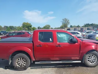 2015 Nissan Frontier Pro-4X with VIN 1N6AD0EV2FN721636, listed as a IAAI auction lot 40310184 with 132,897 mi miles and . Bid and sale history available at DreamBid. Image 13.