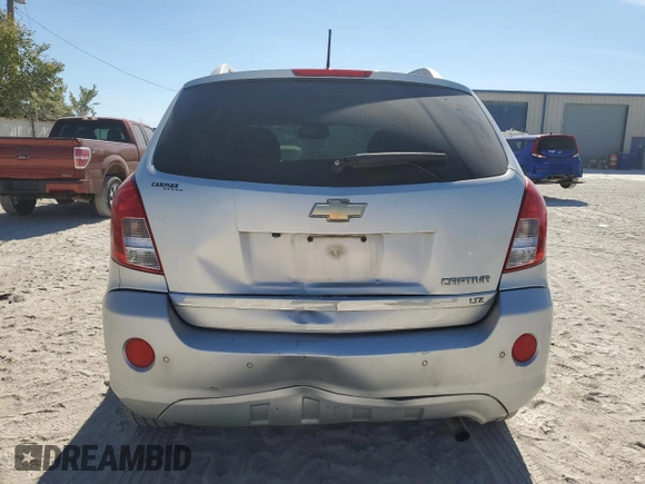 2013 Chevrolet Captiva Sport LTZ with VIN 3GNAL4EK3DS619680, listed as a Copart auction lot 77015684 with 163,155 mi miles and Salvage Title. Bid and sale history available at DreamBid. Image 6.