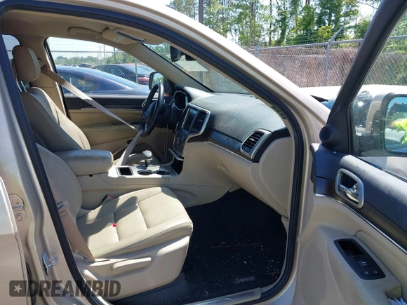 2014 Jeep Grand Cherokee Limited with VIN 1C4RJEBG4EC528934, listed as a IAAI auction lot 42033511 with 63,601 mi miles and . Bid and sale history available at DreamBid. Image 5.
