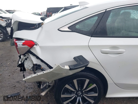 2023 Honda Civic EX z VIN 2HGFE1F79PH324822, wystawiony jako IAAI lot #42017274 z przebiegiem 36 862 mil mil oraz . Historia ofert i sprzedaży dostępna na DreamBid. Obrazek 17.