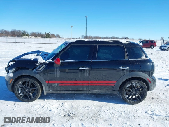 2011 MINI Countryman S with VIN WMWZC5C50BWL55234, listed as a IAAI auction lot 41323339 with 134,709 mi miles and . Bid and sale history available at DreamBid. Image 15.