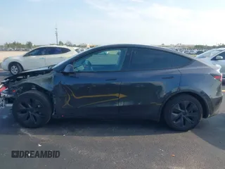 2024 Tesla Model Y with VIN 7SAYGDED3RA329355, listed as a IAAI auction lot 42343269 with 8,334 mi miles and . Bid and sale history available at DreamBid. Image 15.
