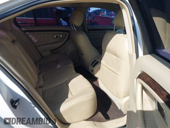 2013 Ford Taurus Limited with VIN 1FAHP2F82DG218533, listed as a IAAI auction lot 41934075 with 172,173 mi miles and . Bid and sale history available at DreamBid. Image 8.