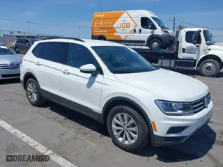 2019 Volkswagen Tiguan S with VIN 3VV1B7AX1KM101407, listed as a IAAI auction lot 42032761 with 51,868 mi miles. Bid and sale history available at carsss.com. Image 1.