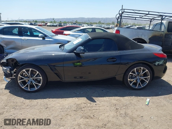 2020 BMW Z4 sDrive30i z VIN WBAHF3C06LWW72769, wystawiony jako IAAI lot #42458058 z przebiegiem 38 448 mil mil oraz . Historia ofert i sprzedaży dostępna na DreamBid. Obrazek 14.