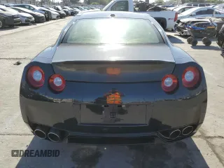2016 Nissan GT-R Premium z VIN JN1AR5EF8GM290918, wystawiony jako Copart lot #58314455 z przebiegiem 23 667 mil mil oraz Szkody całkowita. Historia ofert i sprzedaży dostępna na DreamBid. Obrazek 6.