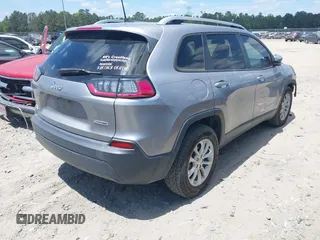 2020 Jeep Cherokee Latitude z VIN 1C4PJLCB6LD582449, wystawiony jako IAAI lot #42149389 z przebiegiem 121 499 mil mil oraz . Historia ofert i sprzedaży dostępna na DreamBid. Obrazek 4.