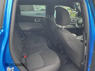 2025 Jeep Compass Sport with VIN 3C4NJDAN5ST528384, listed as a Copart auction lot 56180685 with 4,982 mi miles and Salvage title. Bid and sale history available at DreamBid. Image 6.