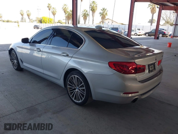2018 BMW 5 Series 530i with VIN WBAJA5C50JWA37179, listed as a IAAI auction lot 42003204 with 74,333 mi miles and . Bid and sale history available at carsss.com. Image 3.