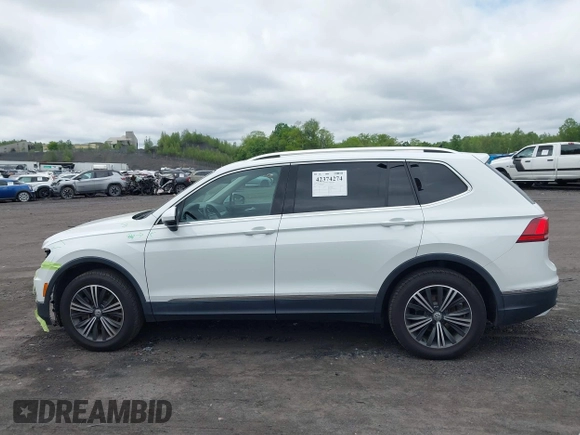 2018 Volkswagen Tiguan SEL with VIN 3VV2B7AX7JM099570, listed as a IAAI auction lot 42374274 with 87,838 mi miles and . Bid and sale history available at DreamBid. Image 14.