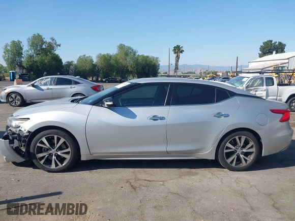 2017 Nissan Maxima Platinum with VIN 1N4AA6AP2HC414204, listed as a IAAI auction lot 42394624 with 80,486 mi miles and . Bid and sale history available at DreamBid. Image 14.