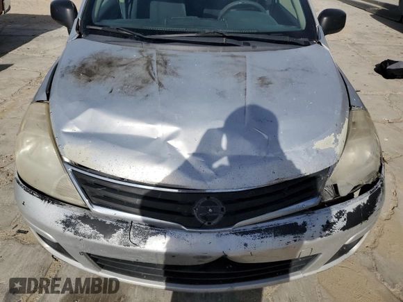 2010 Nissan Versa 1.6 with VIN 3N1CC1AP4AL372566, listed as a Copart auction lot 84704534 with 333,475 mi miles and Salvage Title. Bid and sale history available at carsss.com. Image 11.