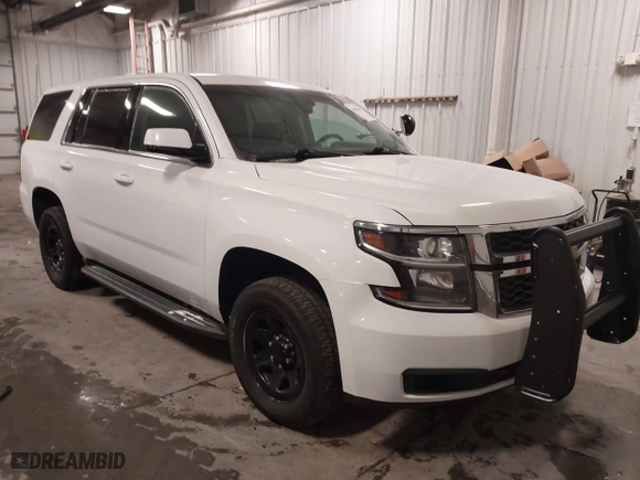 2018 Chevrolet Tahoe Commercial with VIN 1GNSKDEC1JR240868, listed as a IAAI auction lot 41608806 with 138,126 mi miles. Bid and sale history available at carsss.com. Image 1.