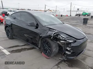 2022 Tesla Model Y Long Range z VIN 7SAYGDEE0NF508958, wystawiony jako IAAI lot #42191819 z przebiegiem 60 880 mil mil oraz . Historia ofert i sprzedaży dostępna na DreamBid. Obrazek 1.