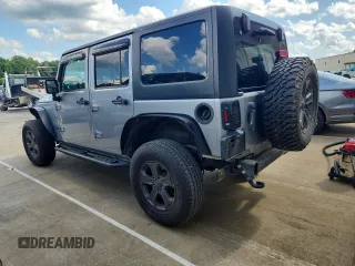 2016 Jeep Wrangler Unlimited Sahara with VIN 1C4BJWEG6GL168944, listed as a Copart auction lot 61650615 with 66,016 mi miles and Salvage title. Bid and sale history available at DreamBid. Image 2.