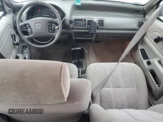 1990 Ford Tempo z VIN 1FAPP36X4LK167346, wystawiony jako Copart lot #84089494 z przebiegiem 66 291 mil mil oraz Szkody całkowita. Historia ofert i sprzedaży dostępna na DreamBid. Obrazek 8.