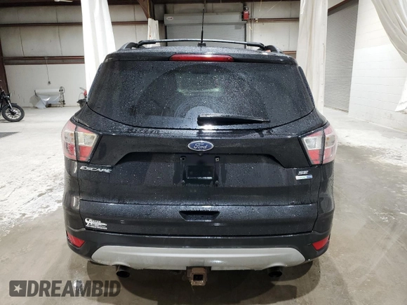 2017 Ford Escape SE with VIN 1FMCU9G96HUE03765, listed as a Copart auction lot 51468405 with 96,963 mi miles and Salvage Title. Bid and sale history available at carsss.com. Image 6.
