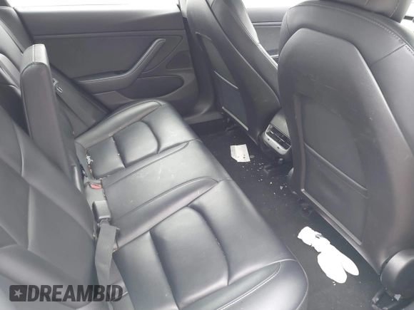 2019 Tesla Model 3 Mid Range with VIN 5YJ3E1EA5KF297213, listed as a IAAI auction lot 41361412 with 93,801 mi miles and . Bid and sale history available at carsss.com. Image 8.