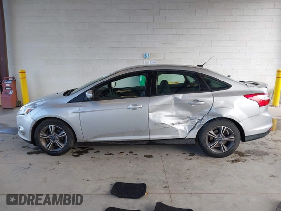2014 Ford Focus SE with VIN 1FADP3F28EL433519, listed as a IAAI auction lot 41969007 with 137,064 mi miles. Bid and sale history available at carsss.com. Image 15.
