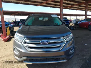 2015 Ford Edge Titanium z VIN 2FMTK3K90FBC12582, wystawiony jako IAAI lot #41860973 z przebiegiem Nie podano mil oraz . Historia ofert i sprzedaży dostępna na DreamBid. Obrazek 11.