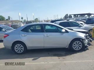 2019 Toyota Corolla L with VIN 2T1BURHE2KC190975, listed as a IAAI auction lot 41901370 with 94,925 mi miles. Bid and sale history available at carsss.com. Image 14.