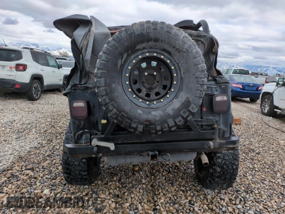 2002 Jeep Wrangler X with VIN 1J4FA39S42P747330, listed as a Copart auction lot 45536485 with 157,289 mi miles and Salvage Title. Bid and sale history available at carsss.com. Image 6.