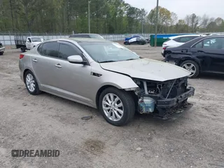 2015 Kia Optima EX with VIN 5XXGN4A76FG409159, listed as a IAAI auction lot 41937814 with 120,641 mi miles. Bid and sale history available at carsss.com. Image 1.