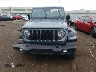 2024 Jeep Wrangler Sport S with VIN 1C4PJXDG1RW305304, listed as a Copart auction lot 57555635 with 5,705 mi miles and Salvage title. Bid and sale history available at DreamBid. Image 5.