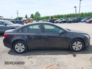 2014 Chevrolet Cruze LS with VIN 1G1PA5SGXE7186074, listed as a IAAI auction lot 42302567 with 152,927 mi miles and . Bid and sale history available at DreamBid. Image 13.
