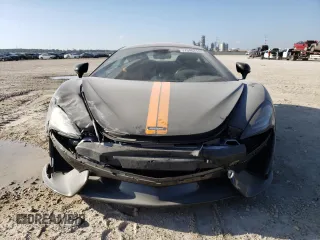 2017 McLaren 570S z VIN SBM13DAA3HW003517, wystawiony jako Copart lot #37948714 z przebiegiem 7587 mil mil oraz . Historia ofert i sprzedaży dostępna na DreamBid. Obrazek 5.