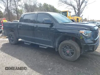 2021 Toyota Tundra SR5 with VIN 5TFDY5F10MX964425, listed as a IAAI auction lot 41843735 with 108,005 mi miles and . Bid and sale history available at DreamBid. Image 1.