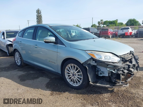 2014 Ford Focus Electric z VIN 1FADP3R41EL238035, wystawiony jako IAAI lot #41975546 z przebiegiem 72 873 mil mil oraz . Historia ofert i sprzedaży dostępna na DreamBid. Obrazek 14.