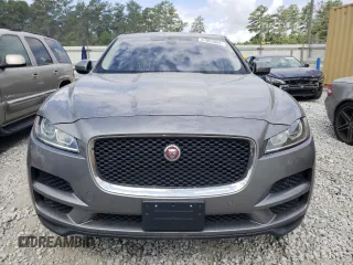 2020 Jaguar F-Pace 25t Premium z VIN SADCJ2FX2LA622614, wystawiony jako Copart lot #61855884 z przebiegiem 116 046 mil mil oraz Szkody całkowita. Historia ofert i sprzedaży dostępna na DreamBid. Obrazek 5.