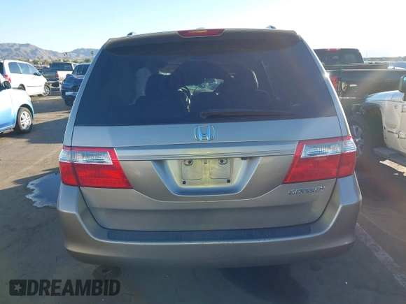 2005 Honda Odyssey EX-L with VIN 5FNRL38755B063203, listed as a IAAI auction lot 41073372 with Not provided miles and . Bid and sale history available at DreamBid. Image 16.