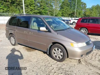 2003 Honda Odyssey EX-L with VIN 5FNRL18913B098839, listed as a IAAI auction lot 42715417 with 226,626 mi miles and . Bid and sale history available at DreamBid. Image 1.