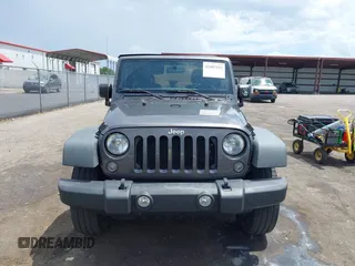 2016 Jeep Wrangler Black Bear with VIN 1C4AJWAGXGL258874, listed as a IAAI auction lot 42497153 with 93,294 mi miles and . Bid and sale history available at DreamBid. Image 12.
