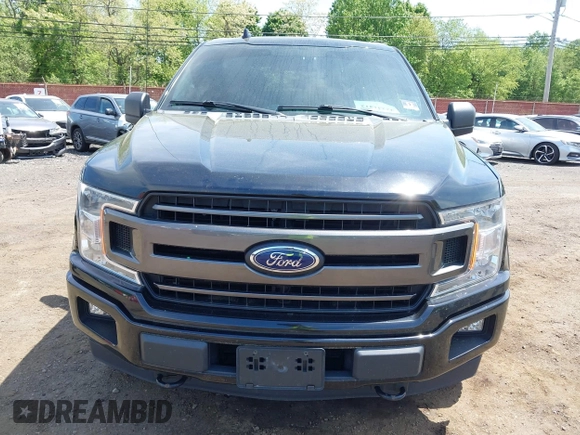 2018 Ford F-150 XL with VIN 1FTEW1EG0JFB61382, listed as a IAAI auction lot 42231412 with 101,376 mi miles and . Bid and sale history available at DreamBid. Image 12.
