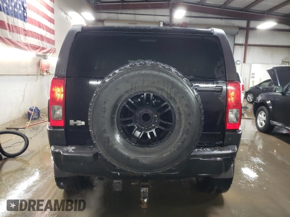 2007 Hummer H3 SUV with VIN 5GTDN13E578119621, listed as a Copart auction lot 41521255 with 142,776 mi miles and Salvage Title. Bid and sale history available at DreamBid. Image 6.