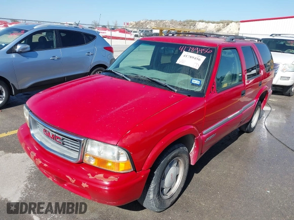 1998 GMC Jimmy SL z VIN 1GKCS13W2W2535684, wystawiony jako IAAI lot #41789456 z przebiegiem 211 201 mil mil oraz . Historia ofert i sprzedaży dostępna na DreamBid. Obrazek 2.