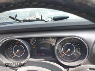 2020 Jeep Wrangler Unlimited Sport S with VIN 1C4HJXDN7LW113735, listed as a IAAI auction lot 42639884 with 48,736 mi miles and . Bid and sale history available at DreamBid. Image 7.