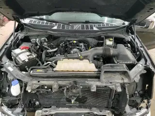 2021 Ford F-150 XLT с VIN 1FTEW1EP6MFA70315, выставлен на аукционе Copart как лот 80089085 с пробегом 70 009 миль миль и Списание • Salvage title. История ставок и продаж доступна на DreamBid. Изображение 14.