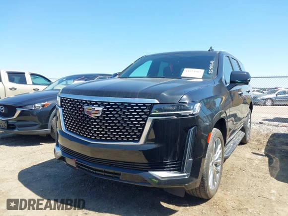 2023 Cadillac Escalade 4WD Premium Luxury with VIN 1GYS4BKL0PR409325, listed as a IAAI auction lot 41973567 with 32,398 mi miles and . Bid and sale history available at DreamBid. Image 17.
