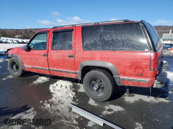 1997 GMC Suburban z VIN 3GKGK26J9VG515459, wystawiony jako Copart lot #87515385 z przebiegiem 205 982 mil mil oraz Szkoda całkowita • Salvage title. Historia ofert i sprzedaży dostępna na DreamBid. Obrazek 2.
