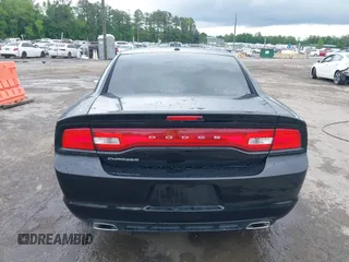 2013 Dodge Charger SE z VIN 2C3CDXBG4DH522639, wystawiony jako IAAI lot #42220383 z przebiegiem 164 319 mil mil oraz . Historia ofert i sprzedaży dostępna na DreamBid. Obrazek 17.