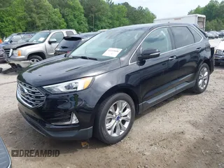 2021 Ford Edge Titanium z VIN 2FMPK3K99MBA16882, wystawiony jako IAAI lot #42214606 z przebiegiem 140 031 mil mil oraz . Historia ofert i sprzedaży dostępna na DreamBid. Obrazek 20.
