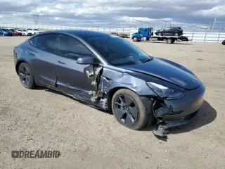 2023 Tesla Model 3 with VIN 5YJ3E1EA3PF707076, listed as a Copart auction lot 48993105 with 30,525 mi miles and Salvage Title. Bid and sale history available at DreamBid. Image 4.