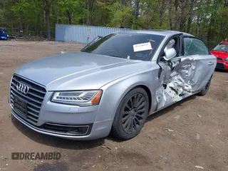 2015 Audi A8 4.0T z VIN WAU32AFD2FN038880, wystawiony jako IAAI lot #42138932 z przebiegiem 102 968 mil mil oraz . Historia ofert i sprzedaży dostępna na DreamBid. Obrazek 2.