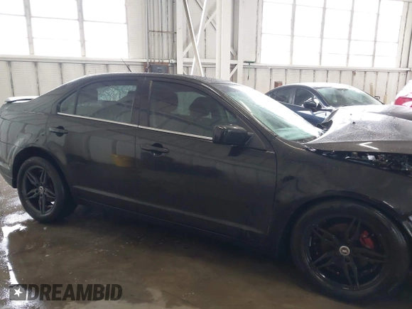 2012 Ford Fusion SE z VIN 3FAHP0HA5CR403929, wystawiony jako IAAI lot #42353429 z przebiegiem 208 668 mil mil oraz . Historia ofert i sprzedaży dostępna na DreamBid. Obrazek 13.